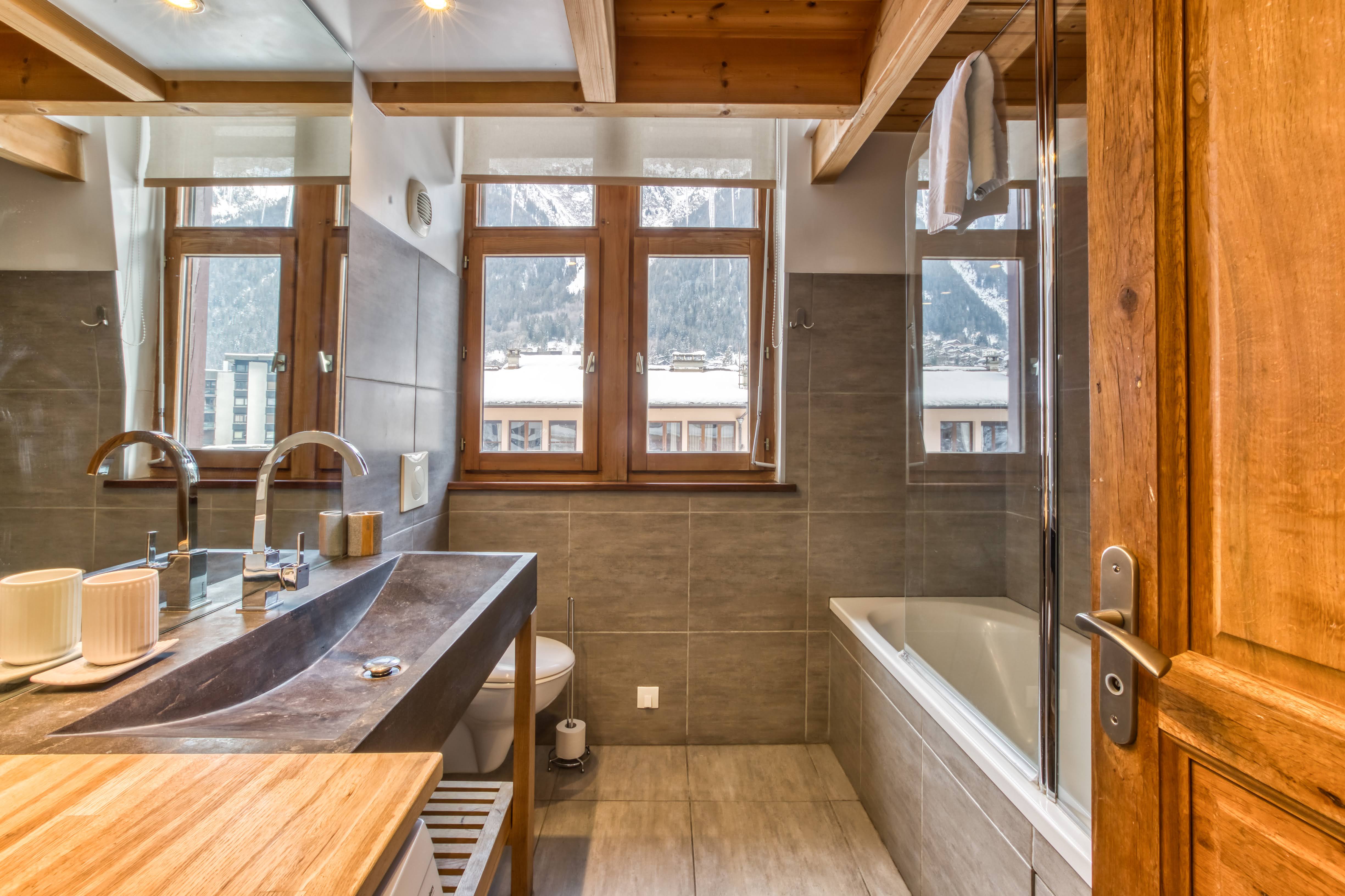 Family bathroom with bath and shower
